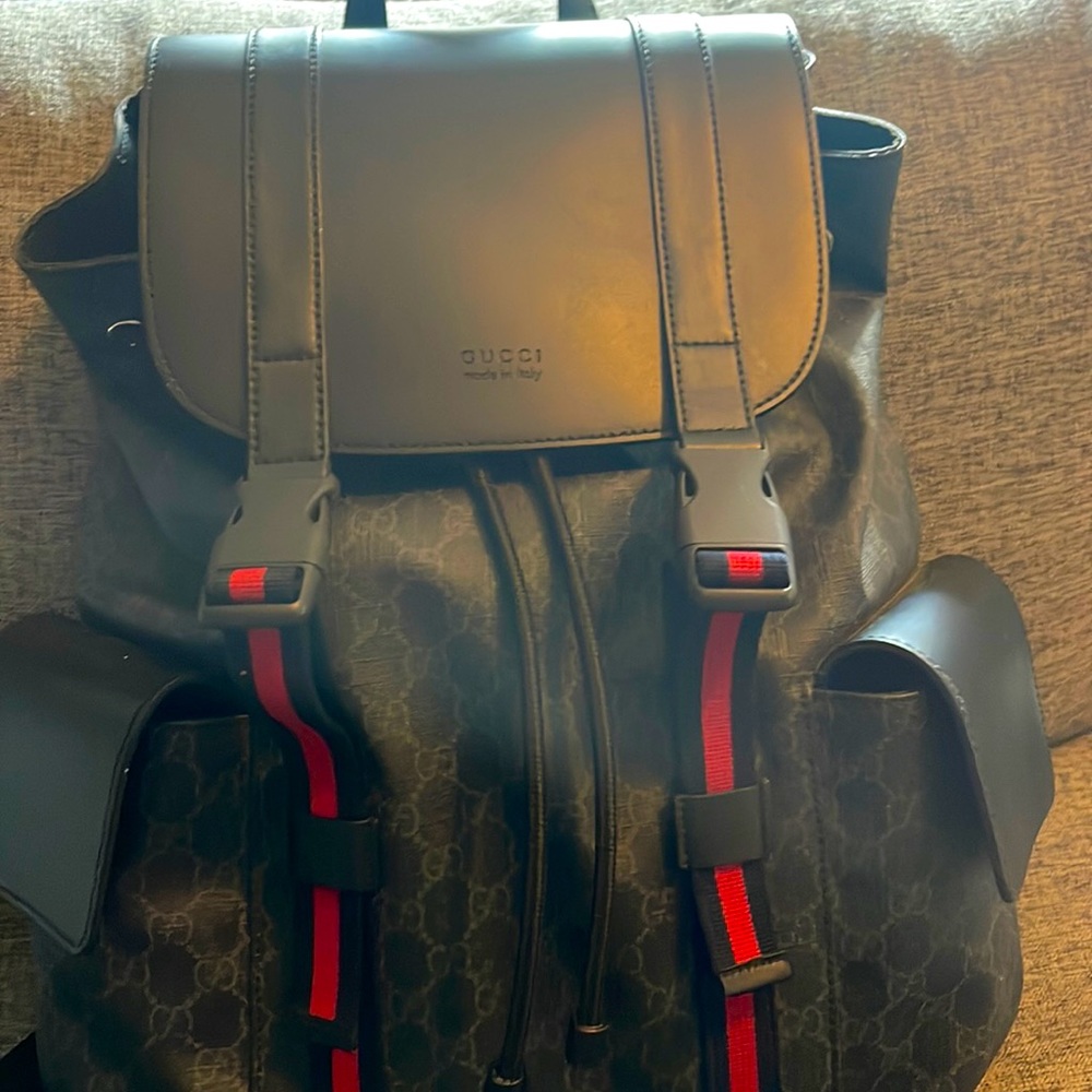Gucci GG  black backpack.